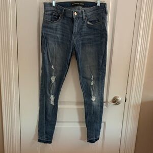 Express Women's Dark Blue Ripped Skinny Jeans